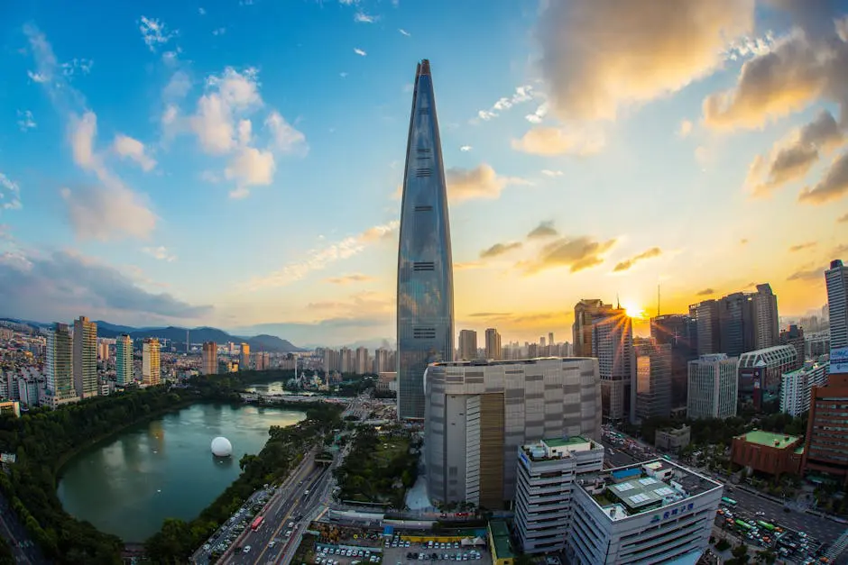 Aerial view of Lotte World Tower and Seoul city skyline at sunset, showcasing modern South Korea’s growth and appeal for expatriates.