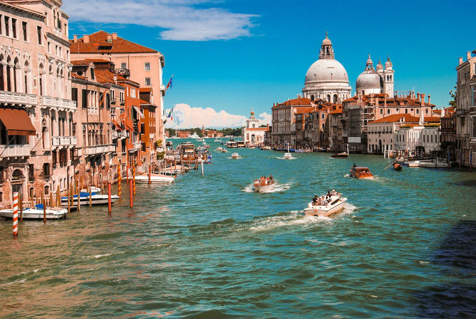 Venice Grand Canal, Italy's iconic view symbolizing Italian culture and lifestyle for expats applying for visas.