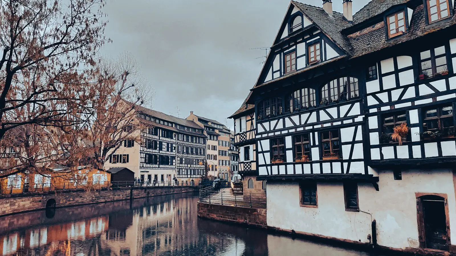 Half-timbered houses and canal reflections in Strasbourg’s historic Petite France district.