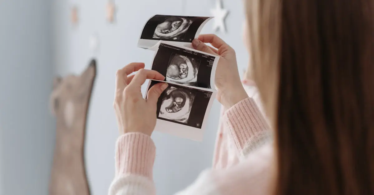 Woman holding ultrasound images, representing the future of private medical insurance and advanced healthcare for families.