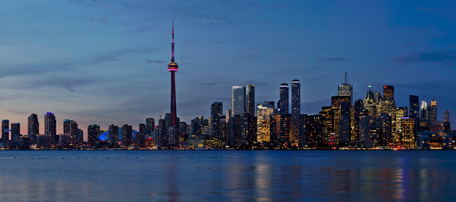 Photo by Jochem Raat CN tower during daytime